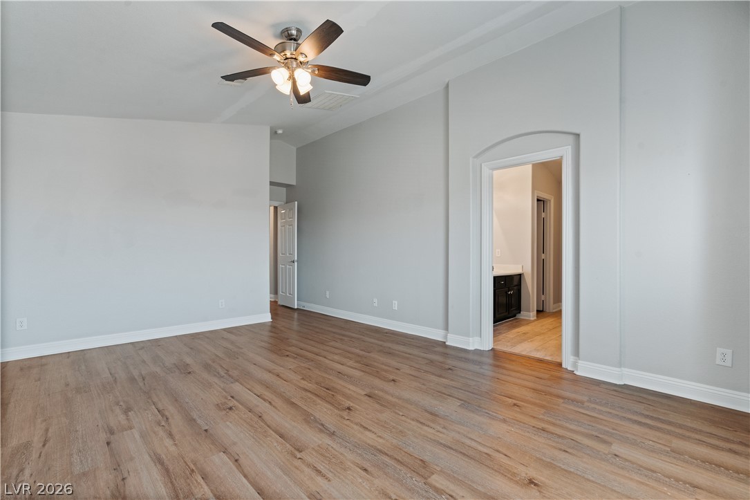 1328 Spice Ridge Court Henderson, NV 89012 - Photo 23 of 51 This spacious Primary bedroom offers ample space and a clear layout for comfortable living.