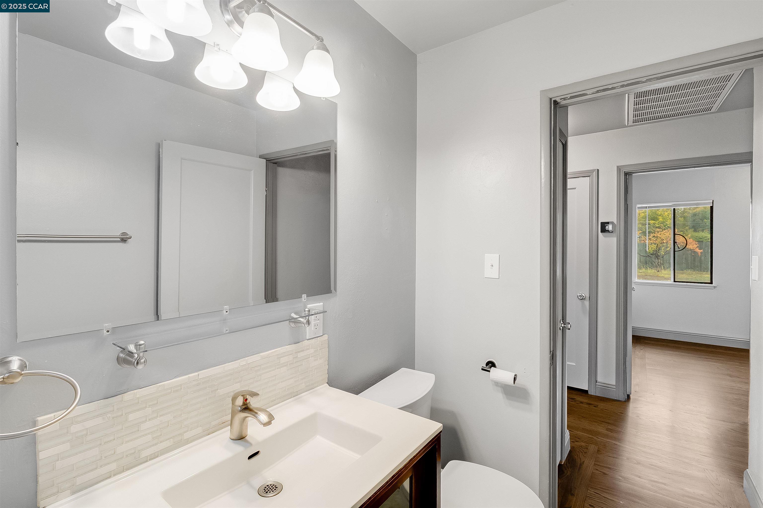 1216 Lincoln Street Fairfield, CA 94533 - Photo 16 of 28 a bathroom with a sink and a mirror