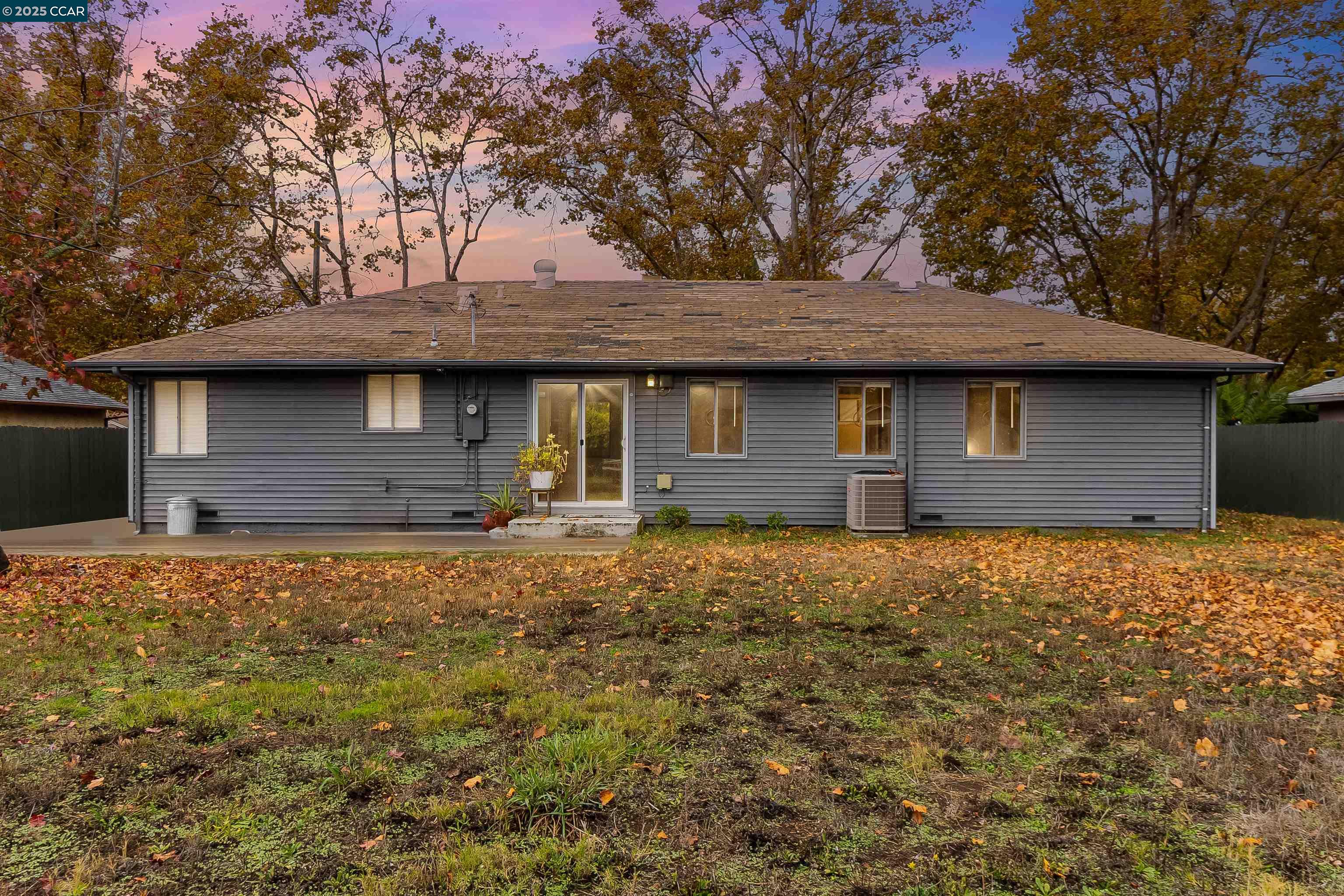 1216 Lincoln Street Fairfield, CA 94533 - Photo 19 of 28 a house with trees in front of it