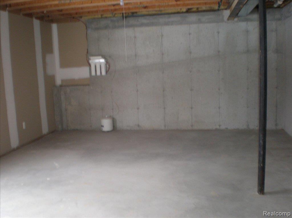 1219 Crystal Pointe Circle, Unit 48 Fenton, MI 48430 - Photo 5 of 25 Full unfinished Walk-Out 2