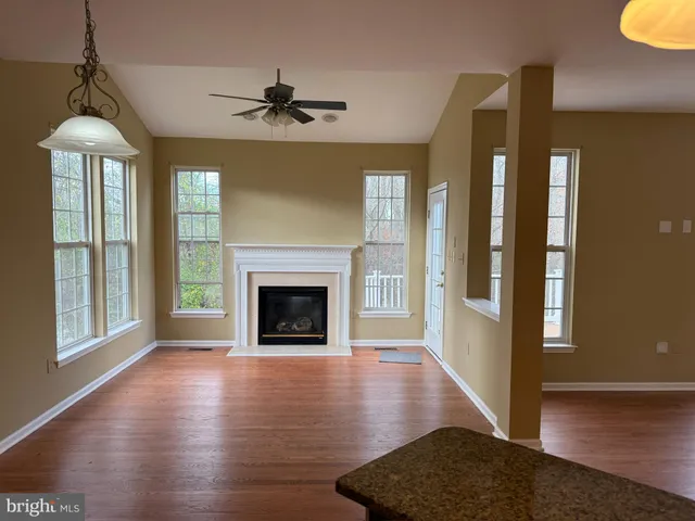 a view of livingroom with window and hardwood floor