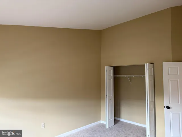 a white bath tub sitting next to a window