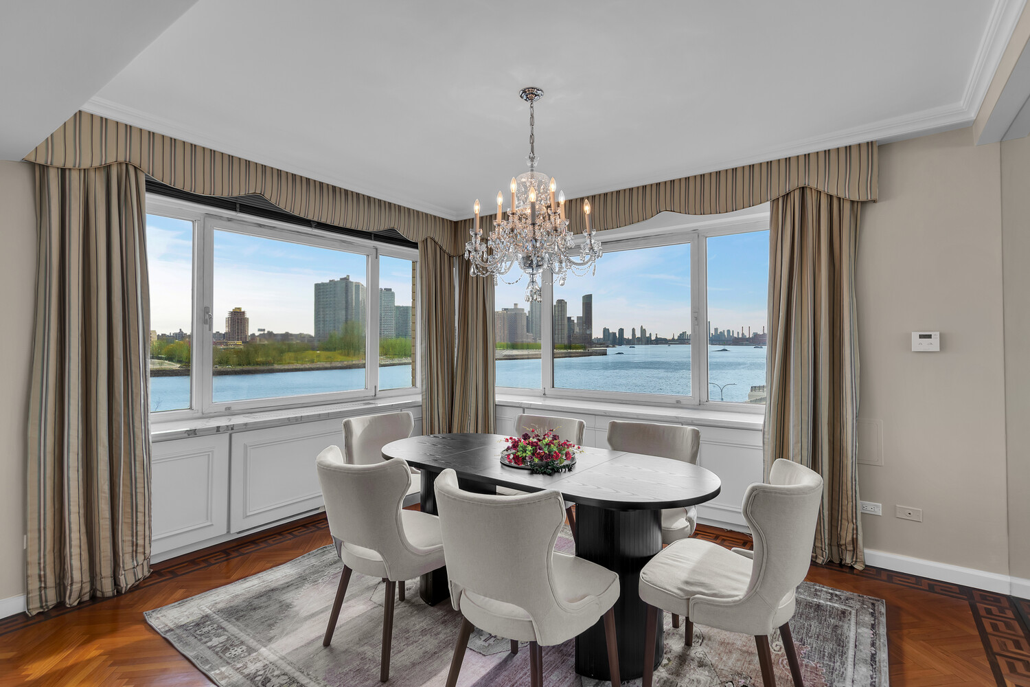 a view of a dining room with furniture window and outside view