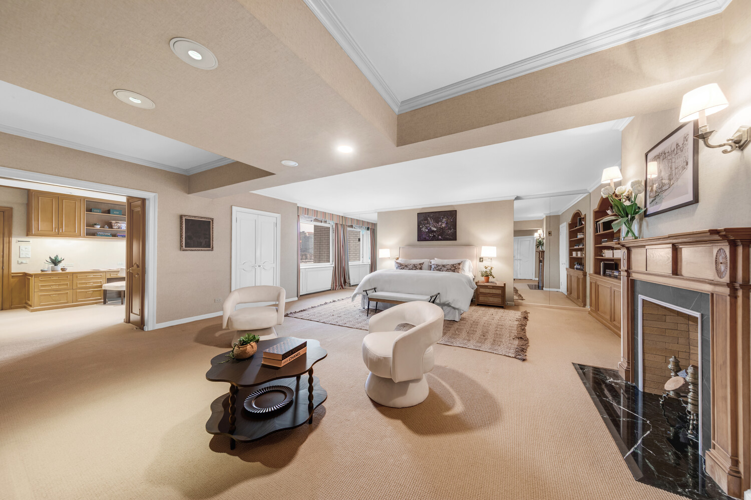 45 Sutton Place South, Unit 3FG Manhattan, NY 10022 - Photo 16 of 28 a living room with furniture fireplace and flat screen tv