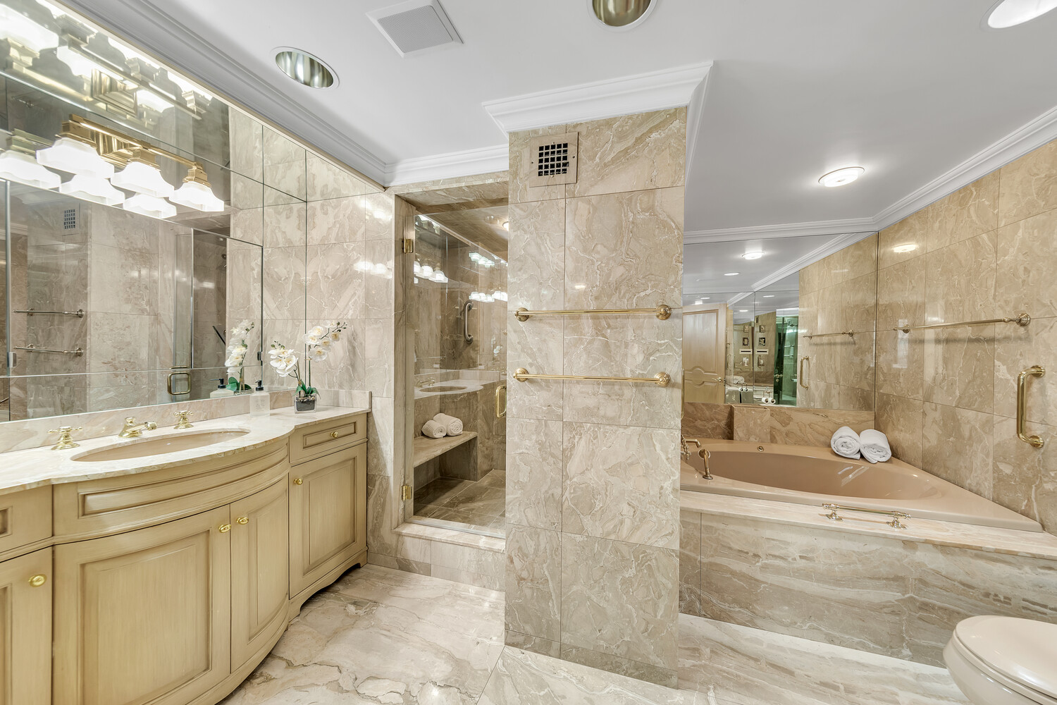 45 Sutton Place South, Unit 3FG Manhattan, NY 10022 - Photo 17 of 28 a bathroom with a double vanity sink mirror and shower