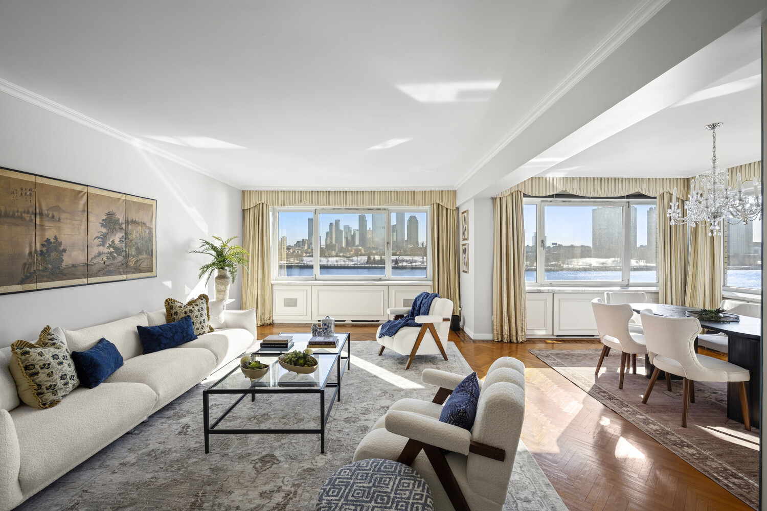 45 Sutton Place South, Unit 3FG Manhattan, NY 10022 - Photo 5 of 28 a living room with furniture and floor to ceiling windows