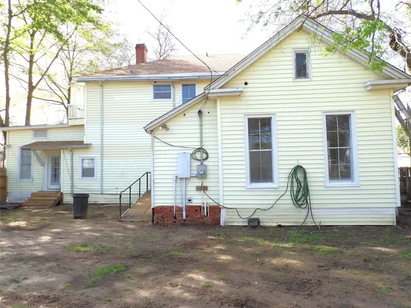 a view of a house with a patio