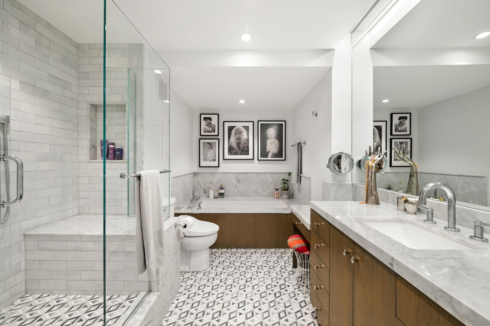 1040 North Lake Shore Drive, Unit 4C Chicago, IL 60611 - Photo 17 of 31 a bathroom with a granite countertop sink mirror vanity and toilet