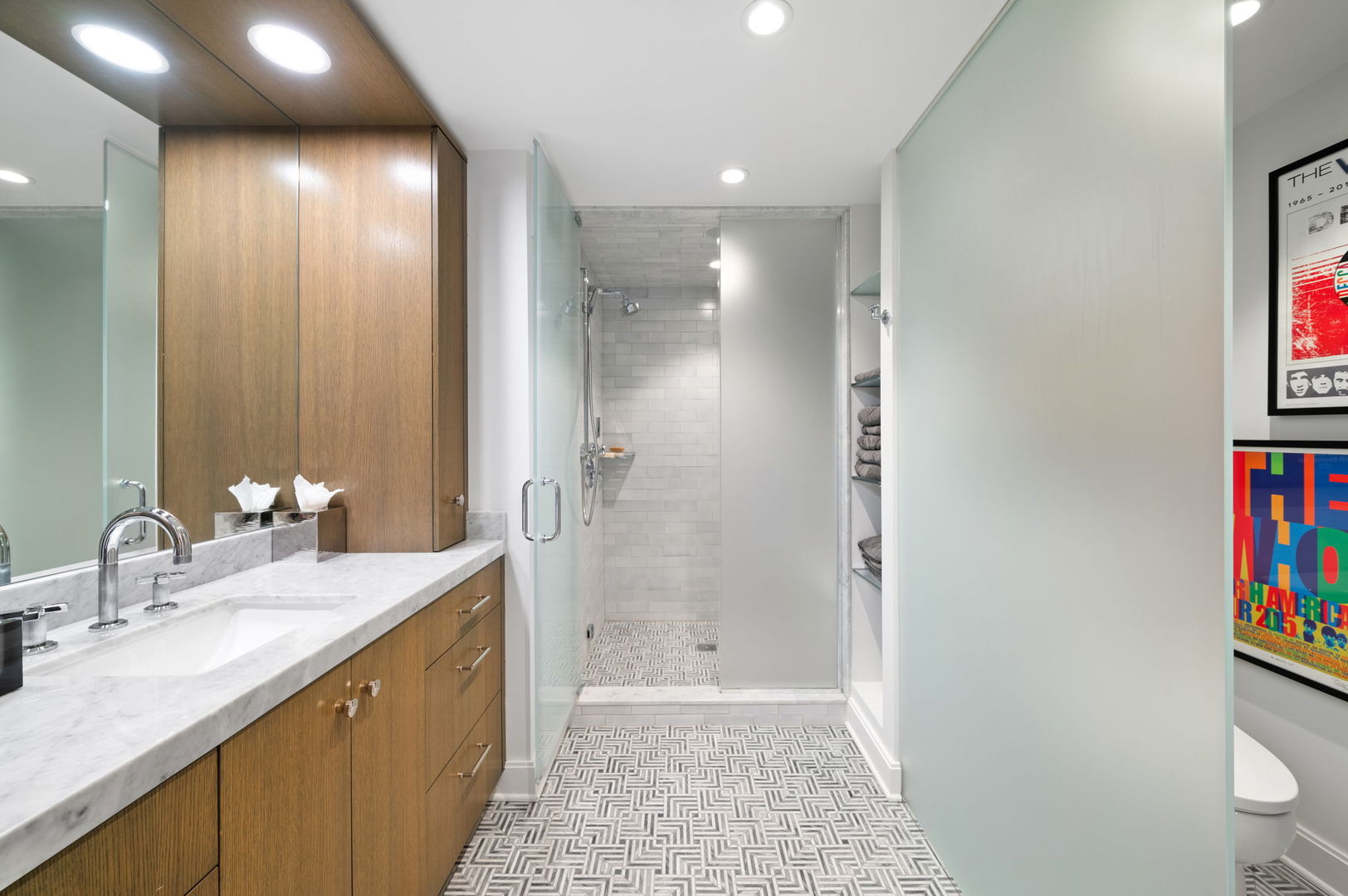 1040 North Lake Shore Drive, Unit 4C Chicago, IL 60611 - Photo 19 of 31 a bathroom with a sink and a mirror