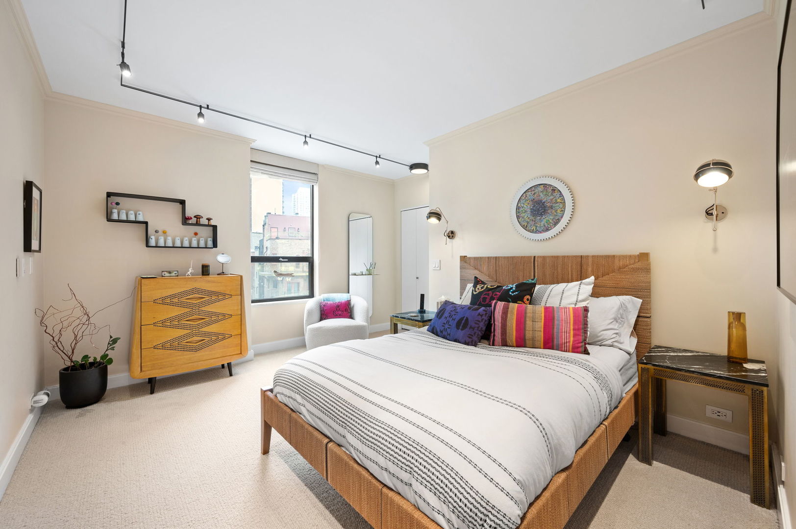 1040 North Lake Shore Drive, Unit 4C Chicago, IL 60611 - Photo 21 of 31 a bedroom with bed and chair