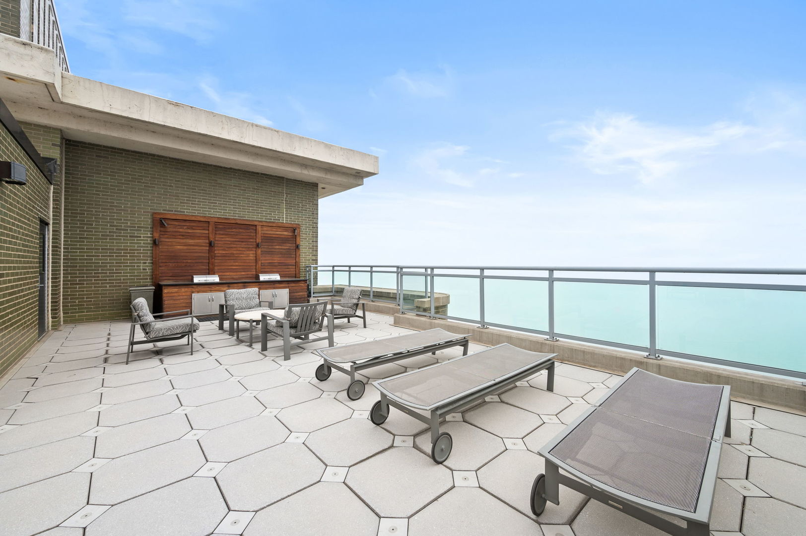 1040 North Lake Shore Drive, Unit 4C Chicago, IL 60611 - Photo 30 of 31 a view of terrace with seating area and roof