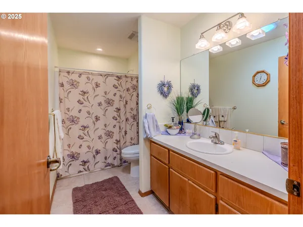 a bed room with a bed and a window