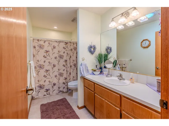 a bed room with a bed and a window