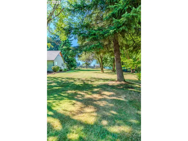 a view of a bedroom with washer and dryer