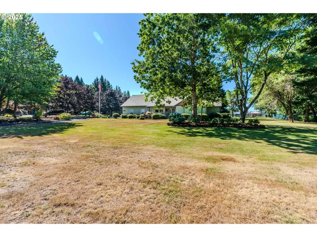 a view of a swimming pool with an outdoor space and seating area