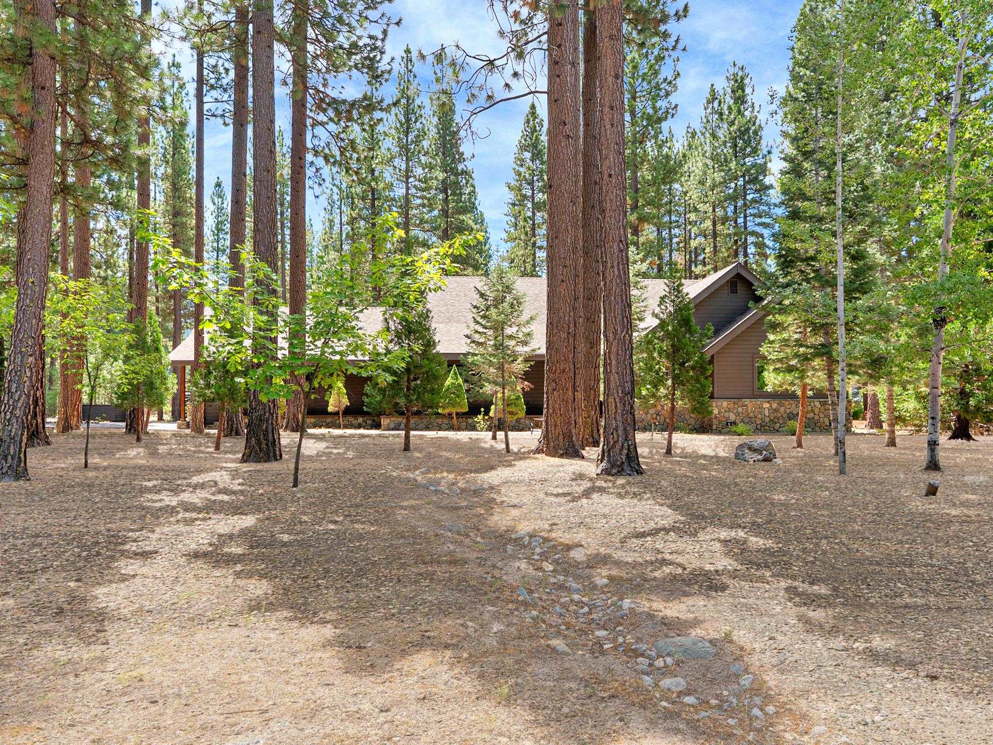 355 Quail View Circle Clio, CA 96106 - Photo 3 of 48 a view of a house with backyard and trees
