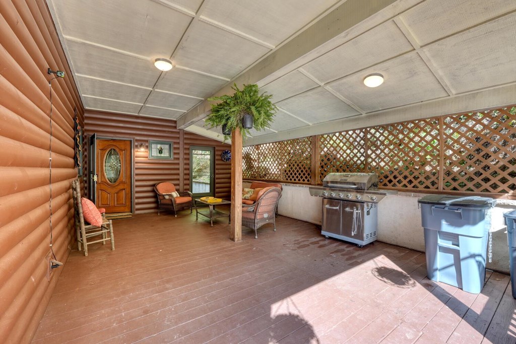 3204 Creekview Road Hiawassee, GA 30546 - Photo 38 of 45 a view of a chairs and table in a patio