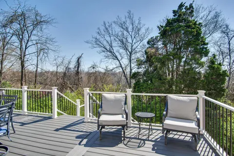 a view of a chairs and table on the wooden floor