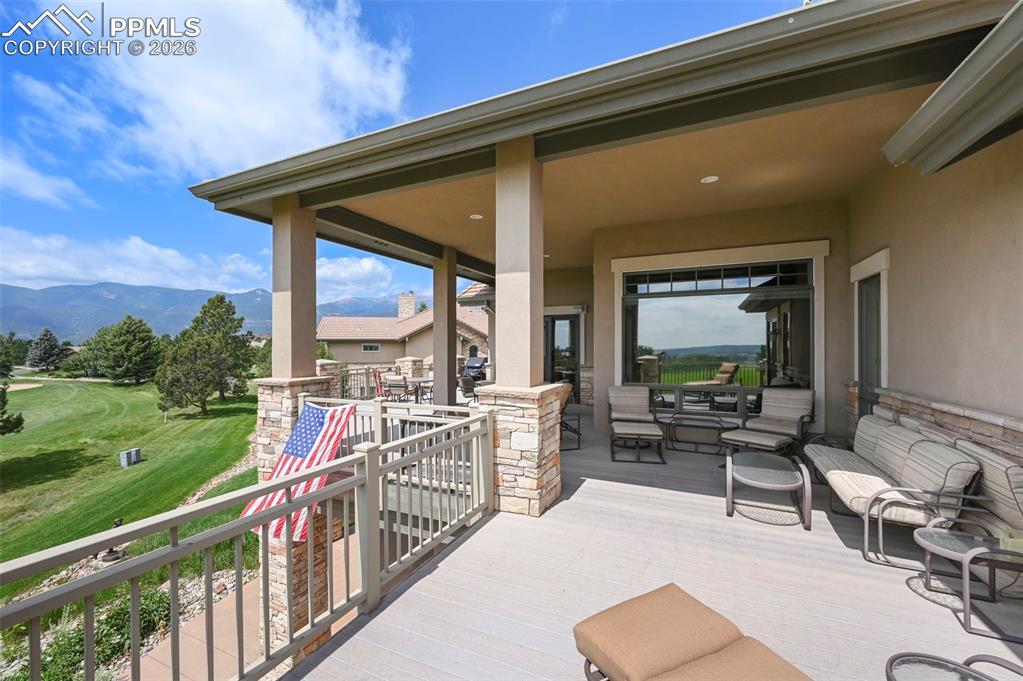 4025 Reserve Point Colorado Springs, CO 80904 - Photo 16 of 50 a view of a porch with furniture and yard