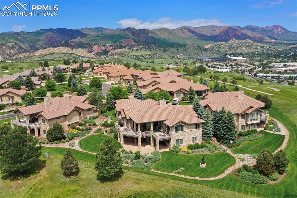 4025 Reserve Point Colorado Springs, CO 80904 - Photo 46 of 50 an aerial view of residential houses with outdoor space and trees