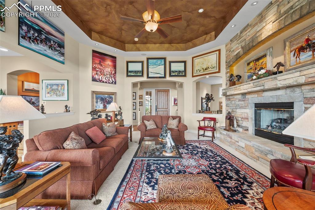4025 Reserve Point Colorado Springs, CO 80904 - Photo 7 of 50 a living room with furniture and a fireplace