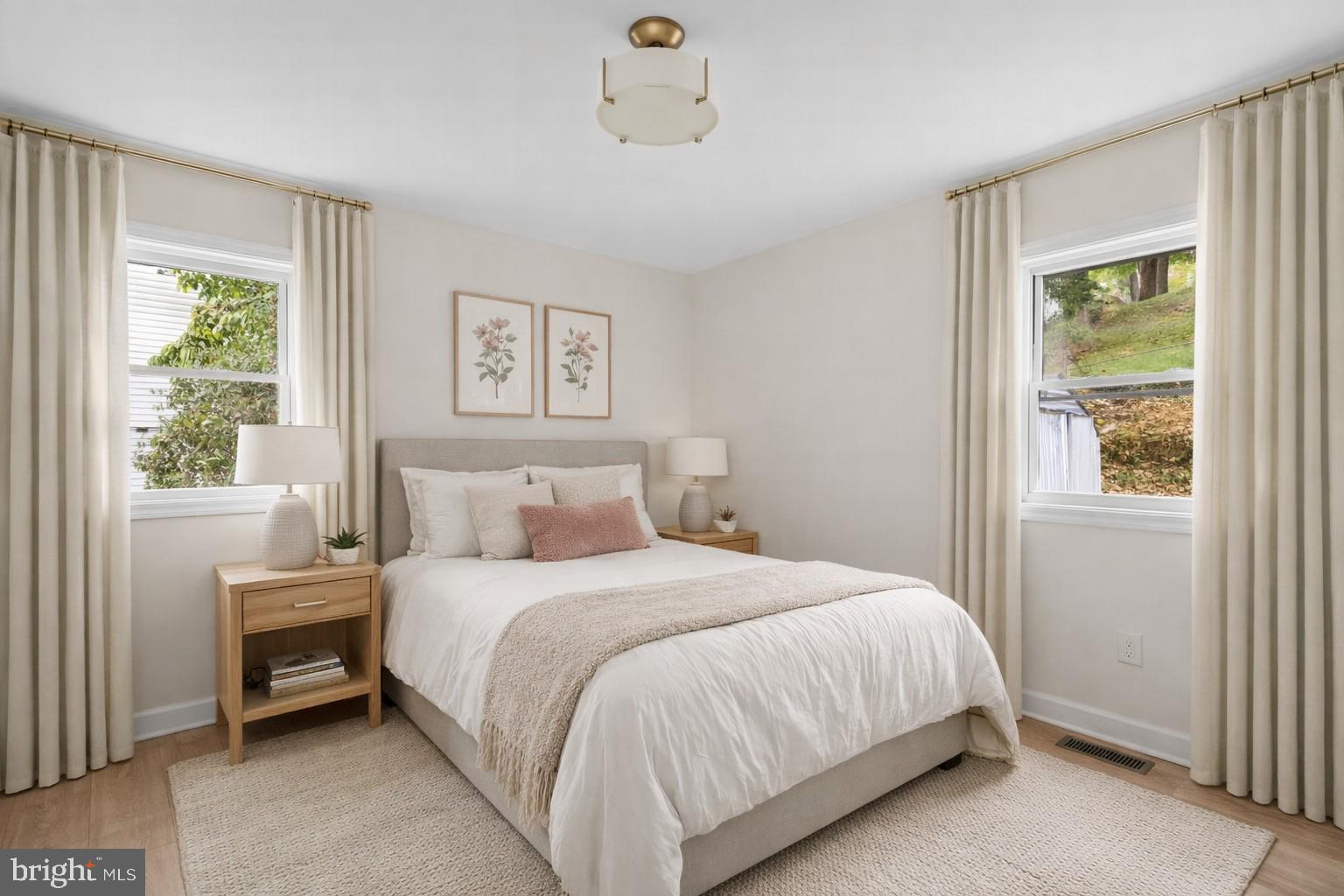 4205 Garrett Park Road Silver Spring, MD 20906 - Photo 15 of 41 a bedroom with a bed and a window