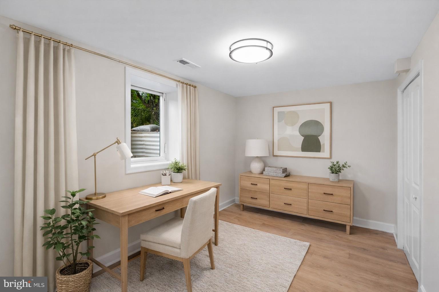 4205 Garrett Park Road Silver Spring, MD 20906 - Photo 32 of 41 a room with furniture and window