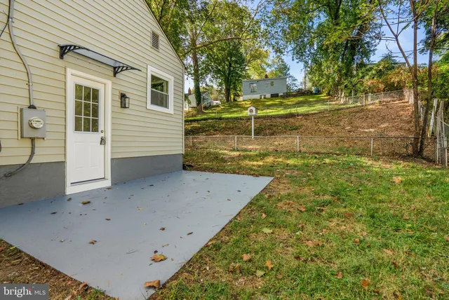 a backyard of a house with lots of green space