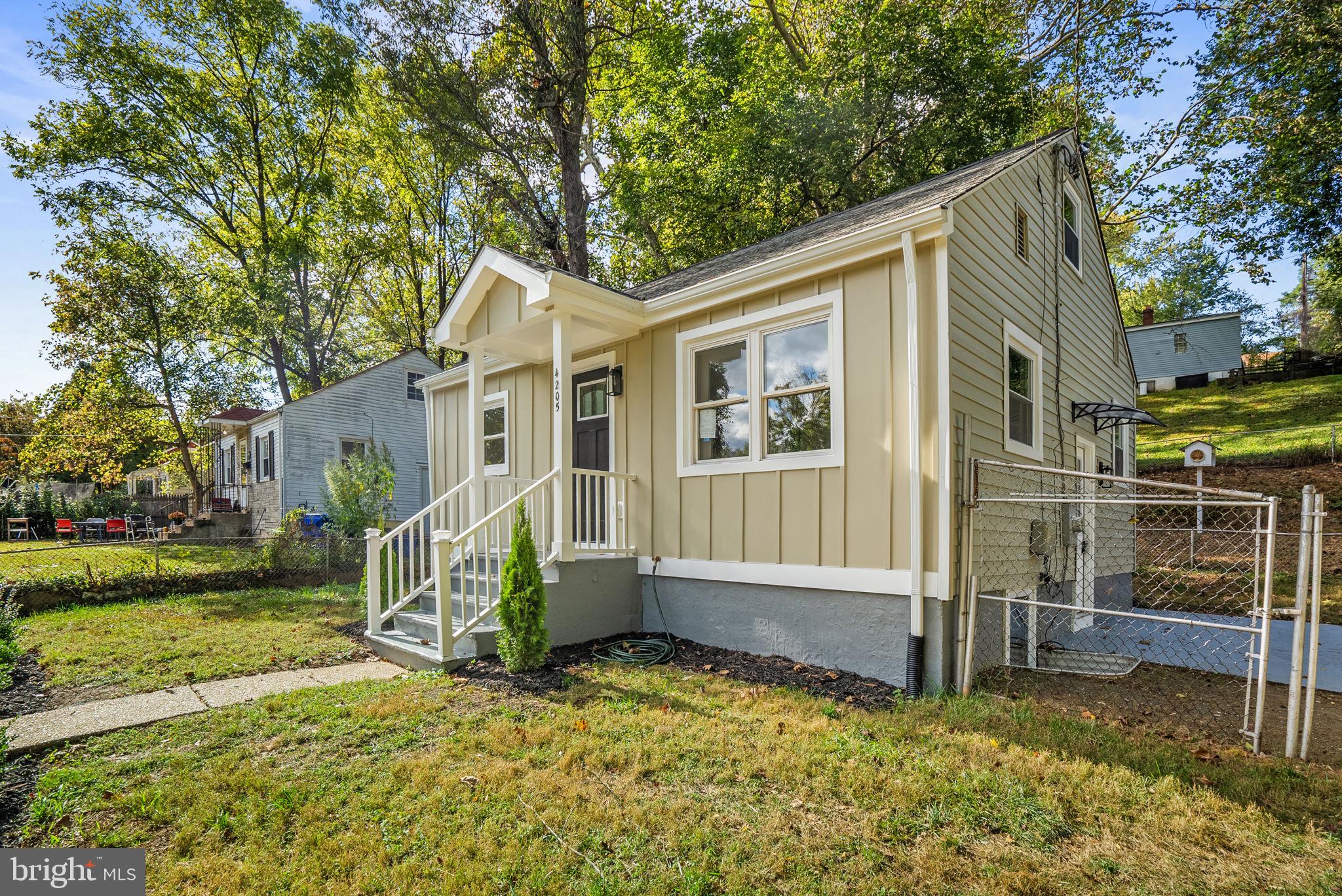 4205 Garrett Park Road Silver Spring, MD 20906 - Photo 4 of 41 a view of a house with a yard
