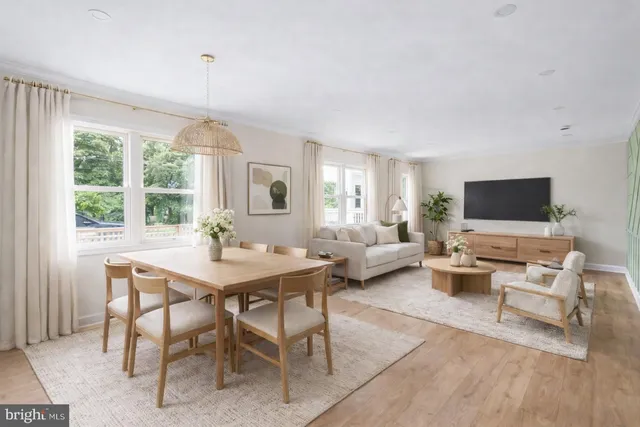 a view of a livingroom with furniture and a table
