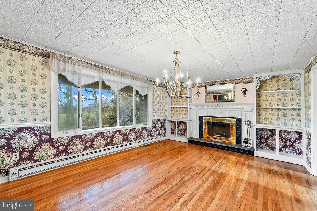 70 East Friendship Church Road Coatesville, PA 19320 - Photo 26 of 28 living room w/ fireplace