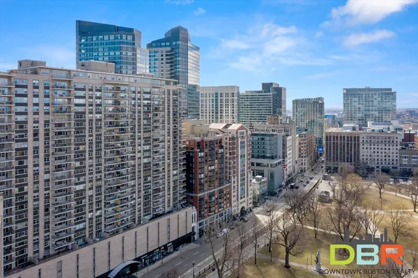 a view of a city with tall buildings