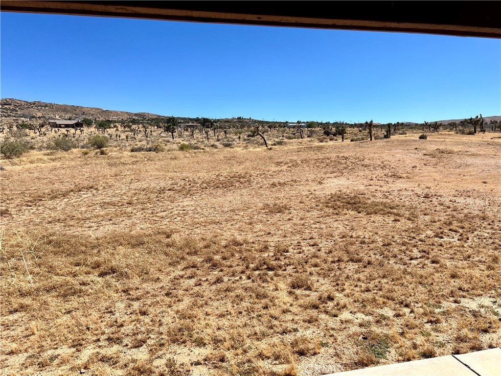 25625 Rancho Street Apple Valley, CA 92308 - Photo 9 of 18 a view of beach and ocean