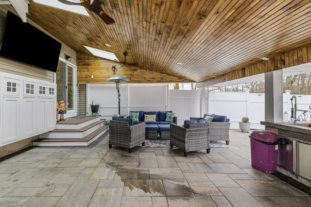 a view of a swimming pool with a patio