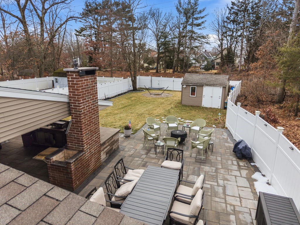 16 Perry Avenue, Unit 16 Taunton, MA 02780 - Photo 3 of 40 a view of a terrace with trees