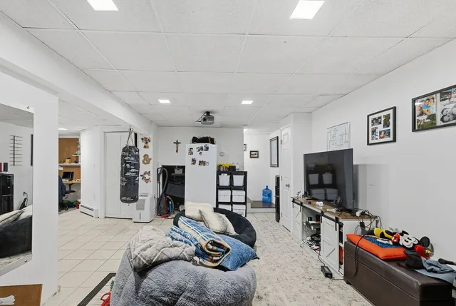 a bed room with a bed and a window