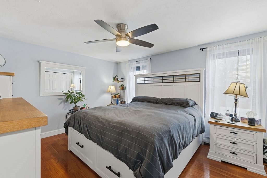 16 Perry Avenue, Unit 16 Taunton, MA 02780 - Photo 35 of 40 a bedroom with a bed and a dresser