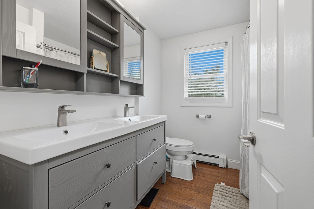 16 Perry Avenue, Unit 16 Taunton, MA 02780 - Photo 38 of 40 a bathroom with a sink and a toilet