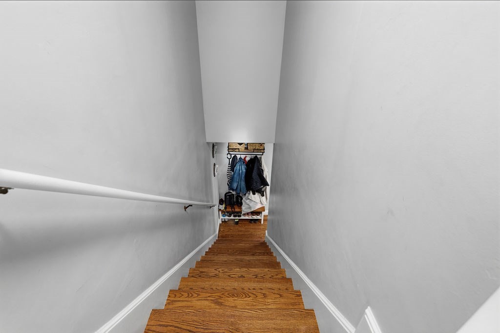 16 Perry Avenue, Unit 16 Taunton, MA 02780 - Photo 39 of 40 a hallway with stairs