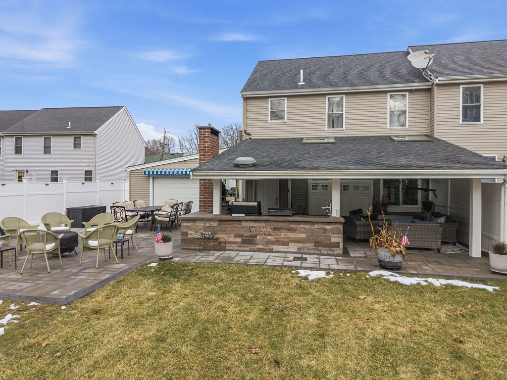 16 Perry Avenue, Unit 16 Taunton, MA 02780 - Photo 6 of 40 a front view of house with outdoor seating