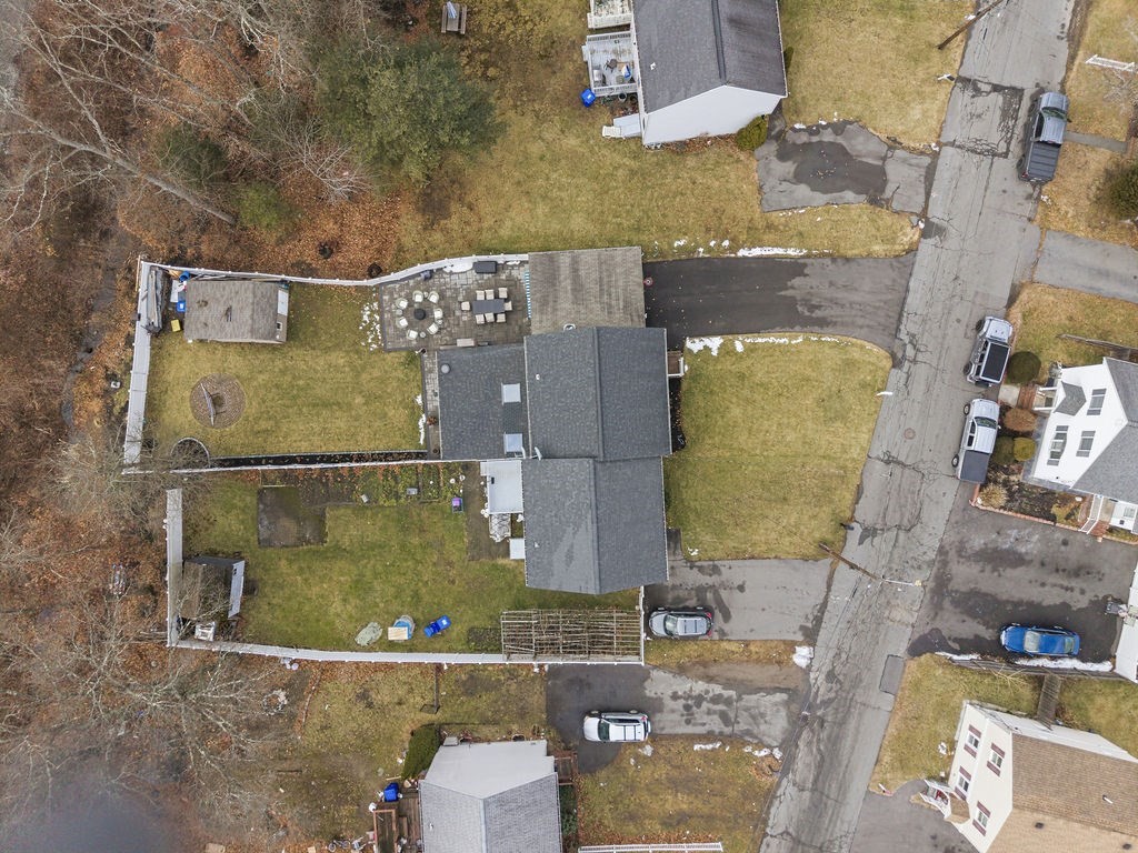16 Perry Avenue, Unit 16 Taunton, MA 02780 - Photo 8 of 40 an aerial view of residential houses with outdoor space