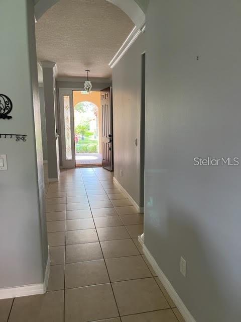 11551 Via Lucerna Circle Windermere, FL 34786 - Photo 15 of 18 a bathroom with a glass door shower
