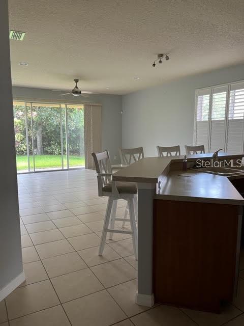 11551 Via Lucerna Circle Windermere, FL 34786 - Photo 6 of 18 a kitchen with a sink and cabinets