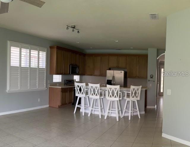 11551 Via Lucerna Circle Windermere, FL 34786 - Photo 7 of 18 a view of a dining room with furniture