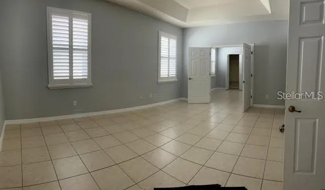a view of an empty room and window