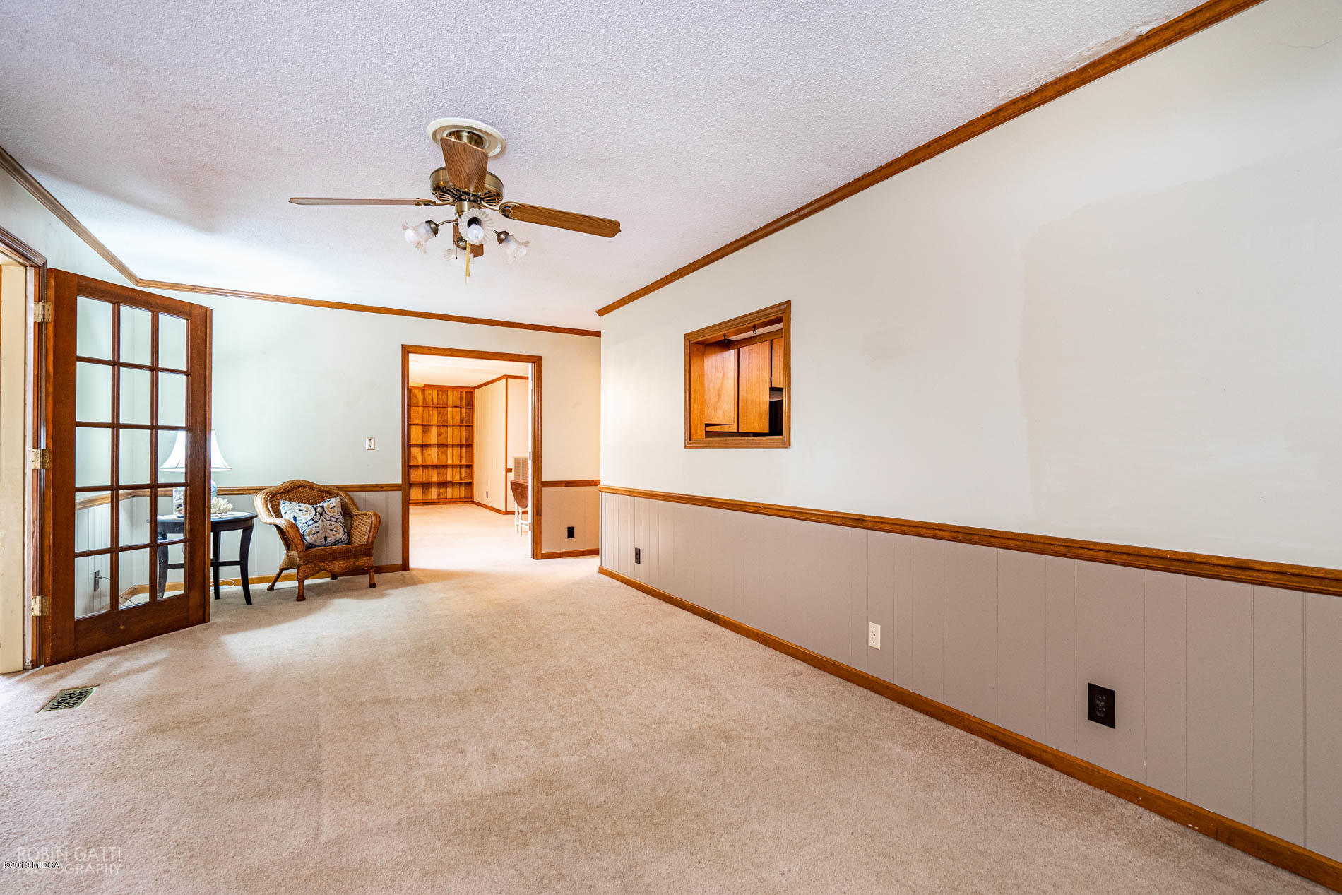 200 Castlegate Road Macon, GA 31210 - Photo 14 of 31 a view of an empty room with furniture and a window
