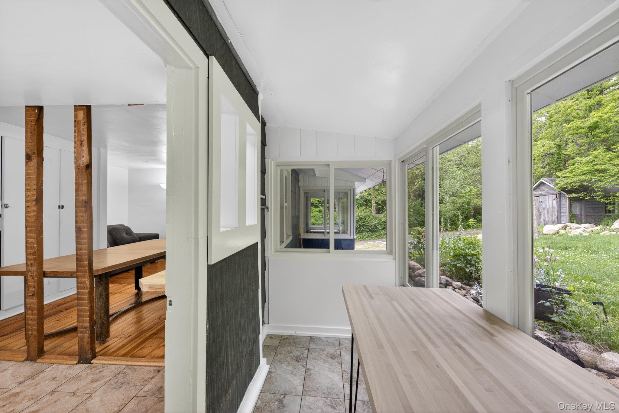 26 Fishkill Road Cold Spring, NY 10516 - Photo 13 of 43 Sunroom View into Kitchen and Dining area.