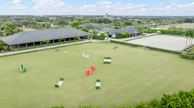 an outdoor space with furniture and garden
