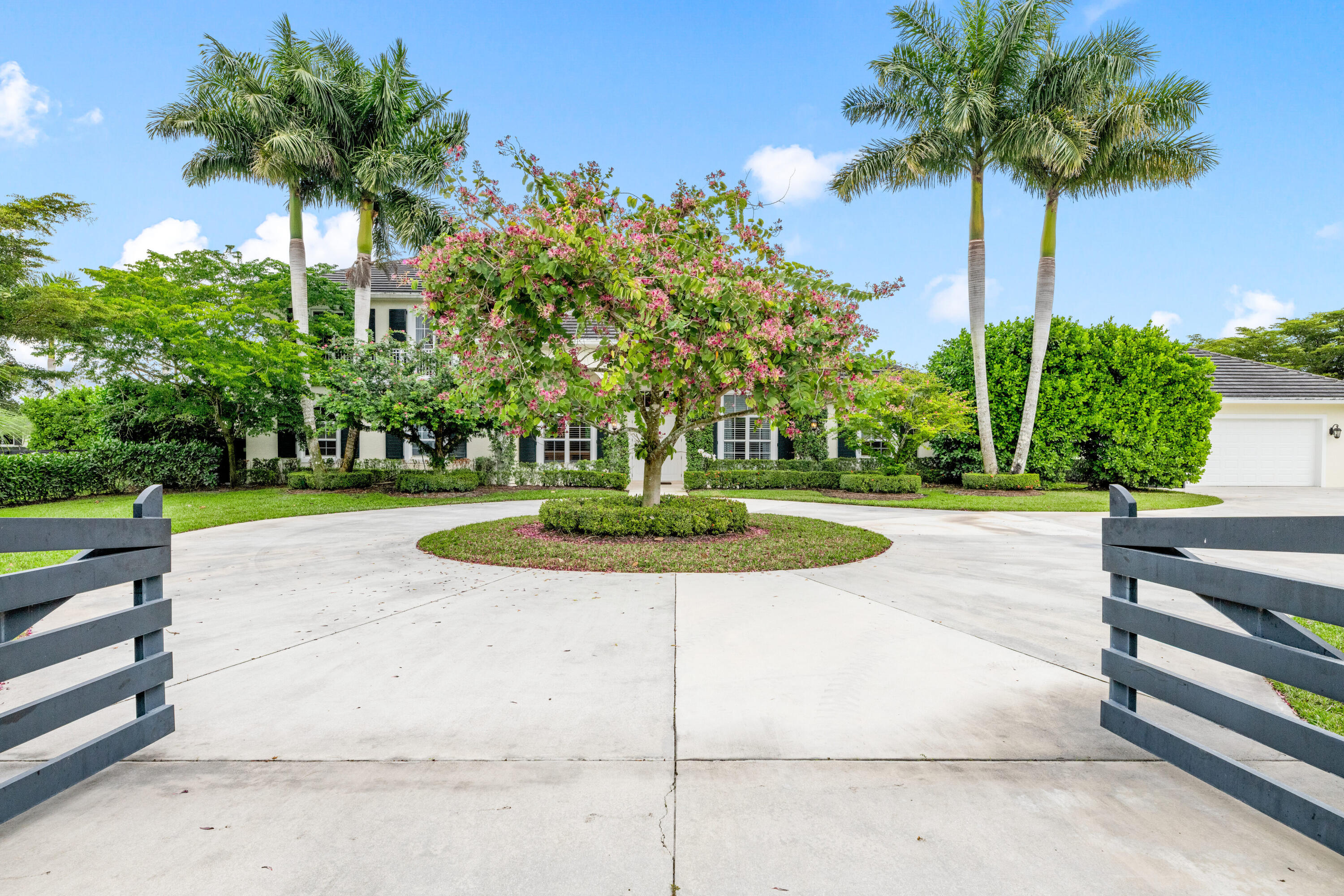 14739 Jumper Road Wellington, FL 33449 - Photo 18 of 124 a view of a garden with palm trees