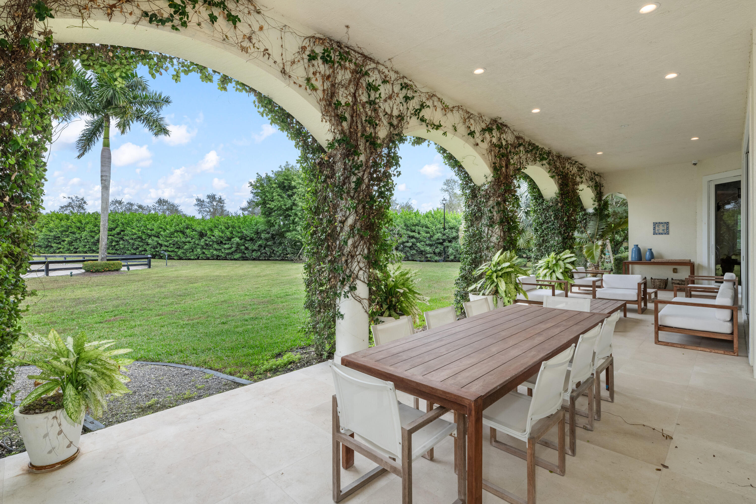 14739 Jumper Road Wellington, FL 33449 - Photo 27 of 124 an outdoor space with furniture and garden